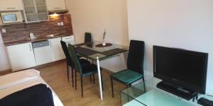 Kuchyňa alebo kuchynka v ubytovaní Aparthotel Rezidence Club Canada Lipno