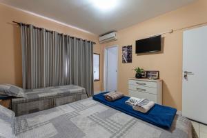 Postel nebo postele na pokoji v ubytování Suítes Balneário Camboriú + 37 fotografií