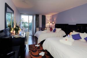 Postel nebo postele na pokoji v ubytování Royal Mirage Fes Hotel