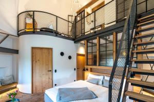 Postel nebo postele na pokoji v ubytování Apart Hotel Wasserturm