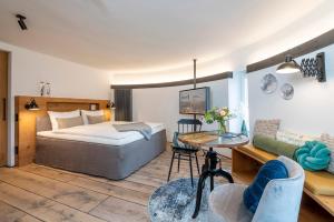 Postel nebo postele na pokoji v ubytování Apart Hotel Wasserturm
