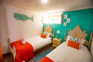 Postel nebo postele na pokoji v ubytování A Barca Charm House + 58 fotografií