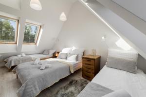 Postelja oz. postelje v sobi nastanitve Apartament Biathlon
