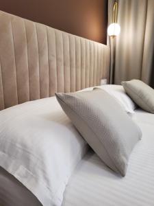 Ein Bett oder Betten in einem Zimmer der Unterkunft Bošket Luxury Rooms