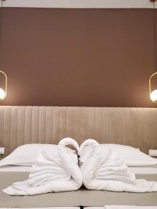 Ein Bett oder Betten in einem Zimmer der Unterkunft Bošket Luxury Rooms