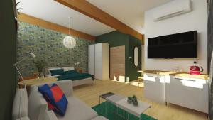 Televízia a/alebo spoločenská miestnosť v ubytovaní Apartmány Meander Thermal & Ski Rezort Oravice