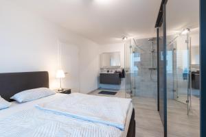 Ένα ή περισσότερα κρεβάτια σε δωμάτιο στο Apartement Laatzen nähe Messe