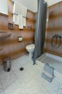 Koupelna v ubytování ROY Hotel
