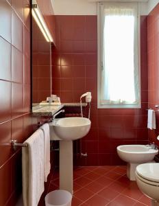 Vannituba majutusasutuses Hotel Brescia