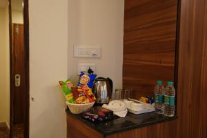 Kaffee-/Teezubehör in der Unterkunft Silicon Inn Hotel Bangalore Airport