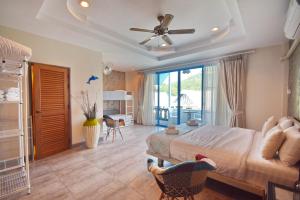 Postel nebo postele na pokoji v ubytování Blu Beach Haven + 35 fotografií