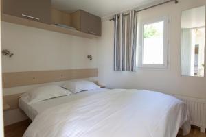 Voodi või voodid majutusasutuse Holidaypark Klein Strand toas