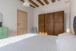 Postel nebo postele na pokoji v ubytování Casa di Ada