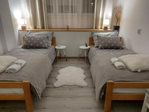 Кровать или кровати в номере Jumi