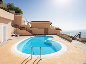 The swimming pool at or close to Apartment Buenavista by Interhome