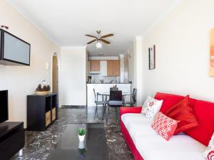 A television and/or entertainment centre at Apartment Buenavista by Interhome