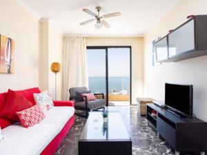 A television and/or entertainment centre at Apartment Buenavista by Interhome