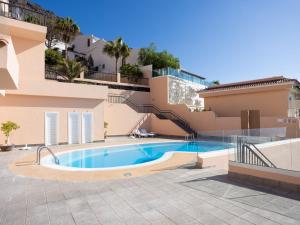 The swimming pool at or close to Apartment Buenavista by Interhome