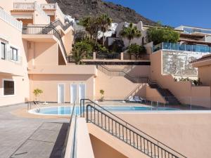 The swimming pool at or close to Apartment Buenavista by Interhome