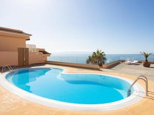 The swimming pool at or close to Apartment Buenavista by Interhome