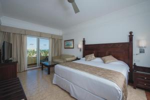 Postel nebo postele na pokoji v ubytování Riu Palace Cabo San Lucas - All Inclusive