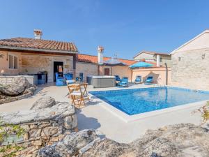 The swimming pool at or close to Apartment Botra Maria - ROJ458 by Interhome