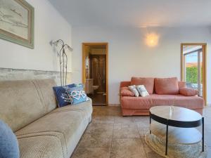 a living room with a couch and a table at Holiday Home Paula by Interhome in Pazin
