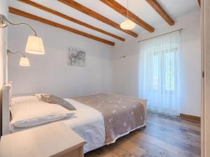 Posteľ alebo postele v izbe v ubytovaní Holiday Home Juste & Roza by Interhome
