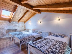Posteľ alebo postele v izbe v ubytovaní Holiday Home Juste & Roza by Interhome