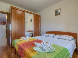 Postel nebo postele na pokoji v ubytování Holiday Home Gracije by Interhome