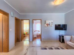 TV a/nebo společenská místnost v ubytování Holiday Home Gracije by Interhome