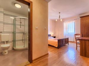 Koupelna v ubytování Holiday Home Gracije by Interhome