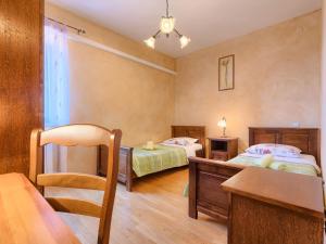 Postel nebo postele na pokoji v ubytování Holiday Home Gracije by Interhome