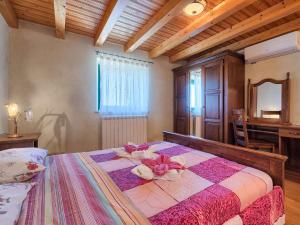 Postel nebo postele na pokoji v ubytování Holiday Home Gracije by Interhome