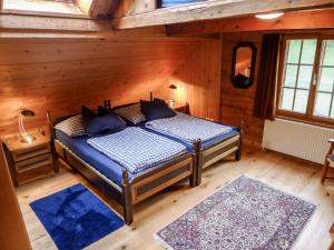 Postel nebo postele na pokoji v ubytování Apartment Bünten by Interhome