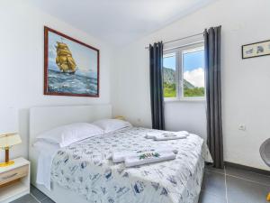 Posteľ alebo postele v izbe v ubytovaní Holiday Home Kilo by Interhome