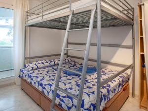 Postel nebo postele na pokoji v ubytování Holiday Home Trebol Blanco by Interhome