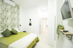 Posteľ alebo postele v izbe v ubytovaní Parigi Hotel bed and Breakfast