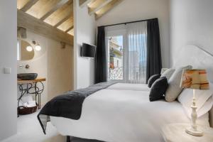 Llit o llits en una habitació de OS ORMOS Casa Rural - Apartamentos - Habitaciones