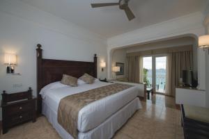 Postel nebo postele na pokoji v ubytování Riu Palace Cabo San Lucas - All Inclusive