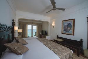 Postel nebo postele na pokoji v ubytování Riu Palace Cabo San Lucas - All Inclusive