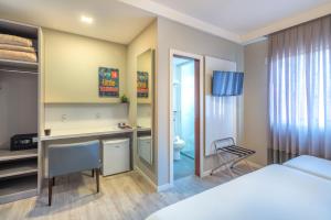 Postel nebo postele na pokoji v ubytování Hotel Melo