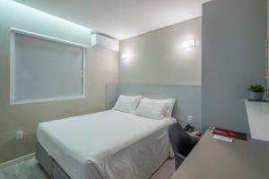 Postel nebo postele na pokoji v ubytování Hotel Melo