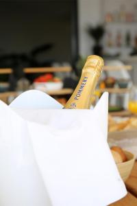 a bottle of champagne sitting inside of a box at Casa Bodhi Boutique Hotel & Spa in Marbella