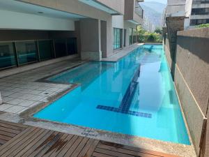 Condomínio Premium Suítes 02 tesisinde veya buraya yakın yüzme havuzu
