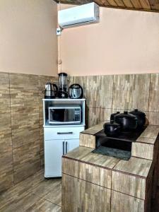 Kjøkken eller kjøkkenkrok på Aluguel casa Bombinhas