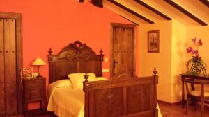 Posteľ alebo postele v izbe v ubytovaní Hotel Bodega La Venta
