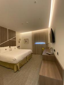 Postel nebo postele na pokoji v ubytování Ansares Hotel