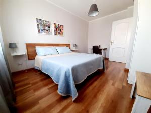 Ένα ή περισσότερα κρεβάτια σε δωμάτιο στο B&B Apartament Umbria6