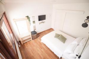 Posteľ alebo postele v izbe v ubytovaní Parigi Hotel bed and Breakfast